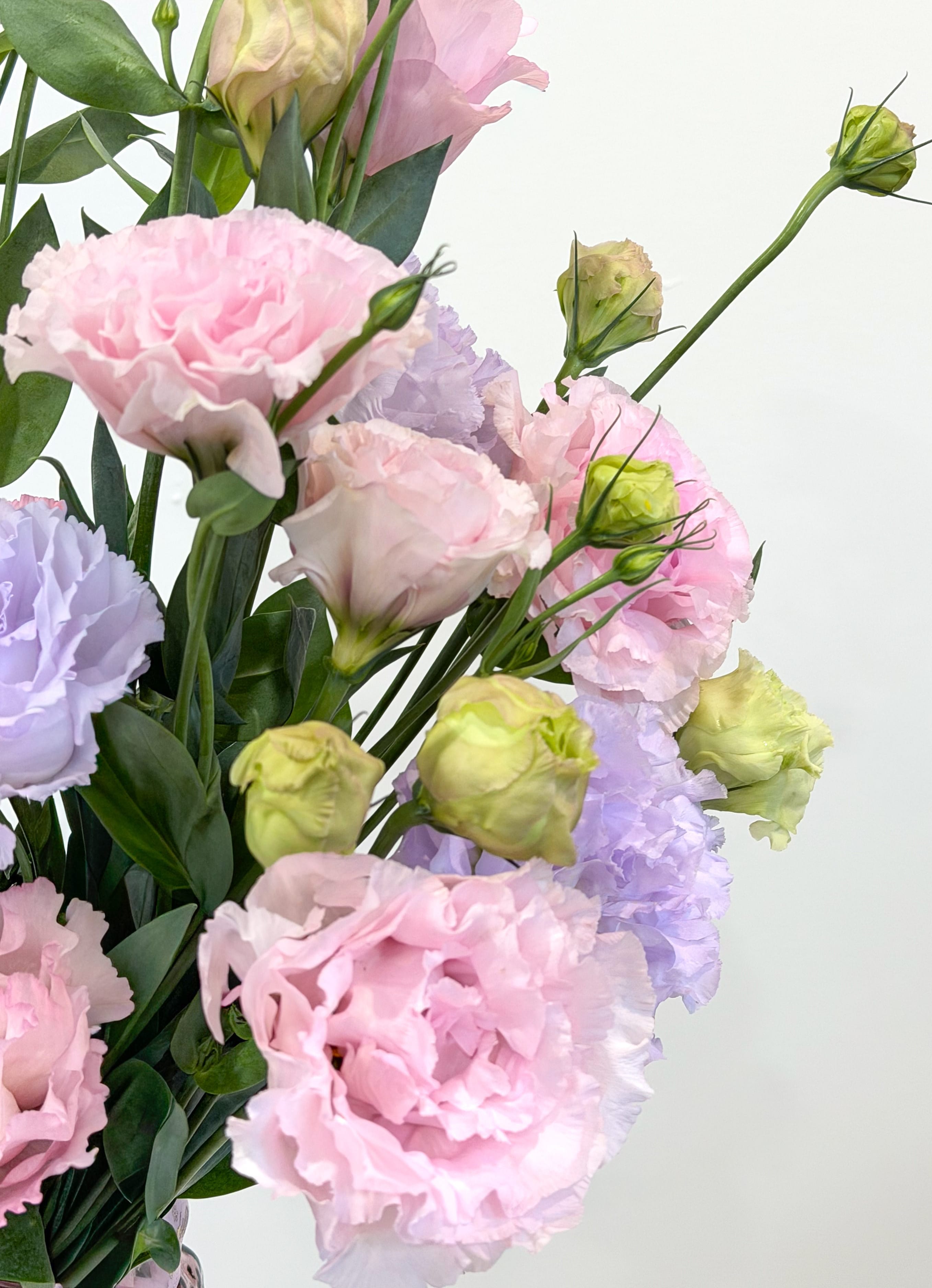 Close-up of blush and lilac lisianthus arrangement by Maison Bloomé Adelaide