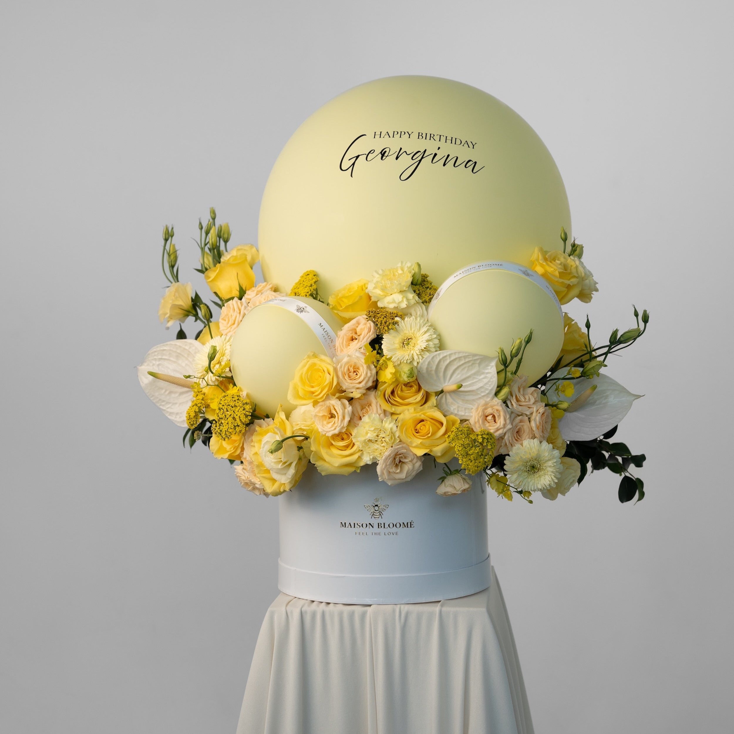 Birthday flower box Adelaide with yellow roses and balloons by Maison Bloomé florist