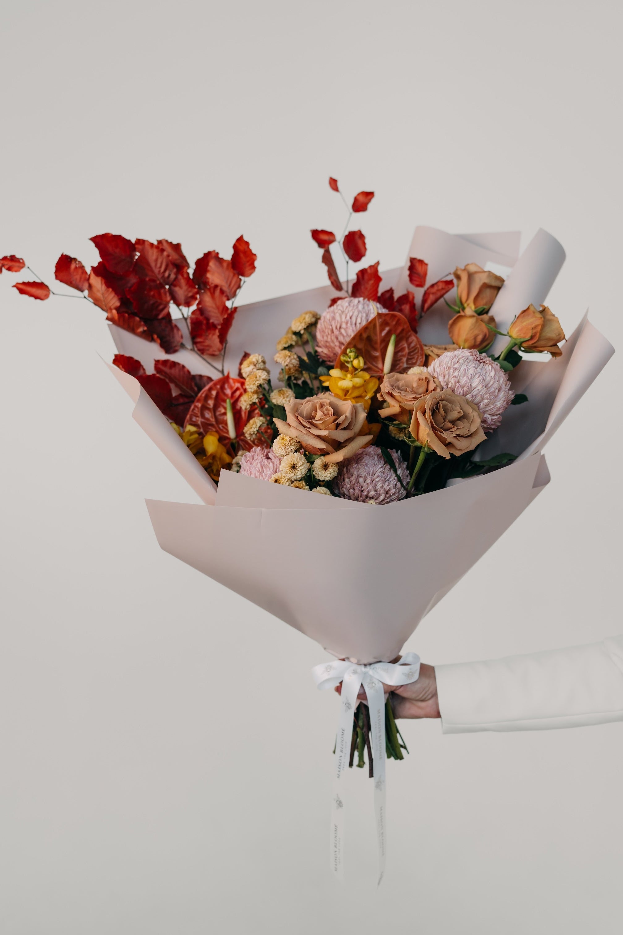 Earthy toned flower bouquet with roses and seasonal blooms for same day delivery by Maison Bloomé florist Adelaide