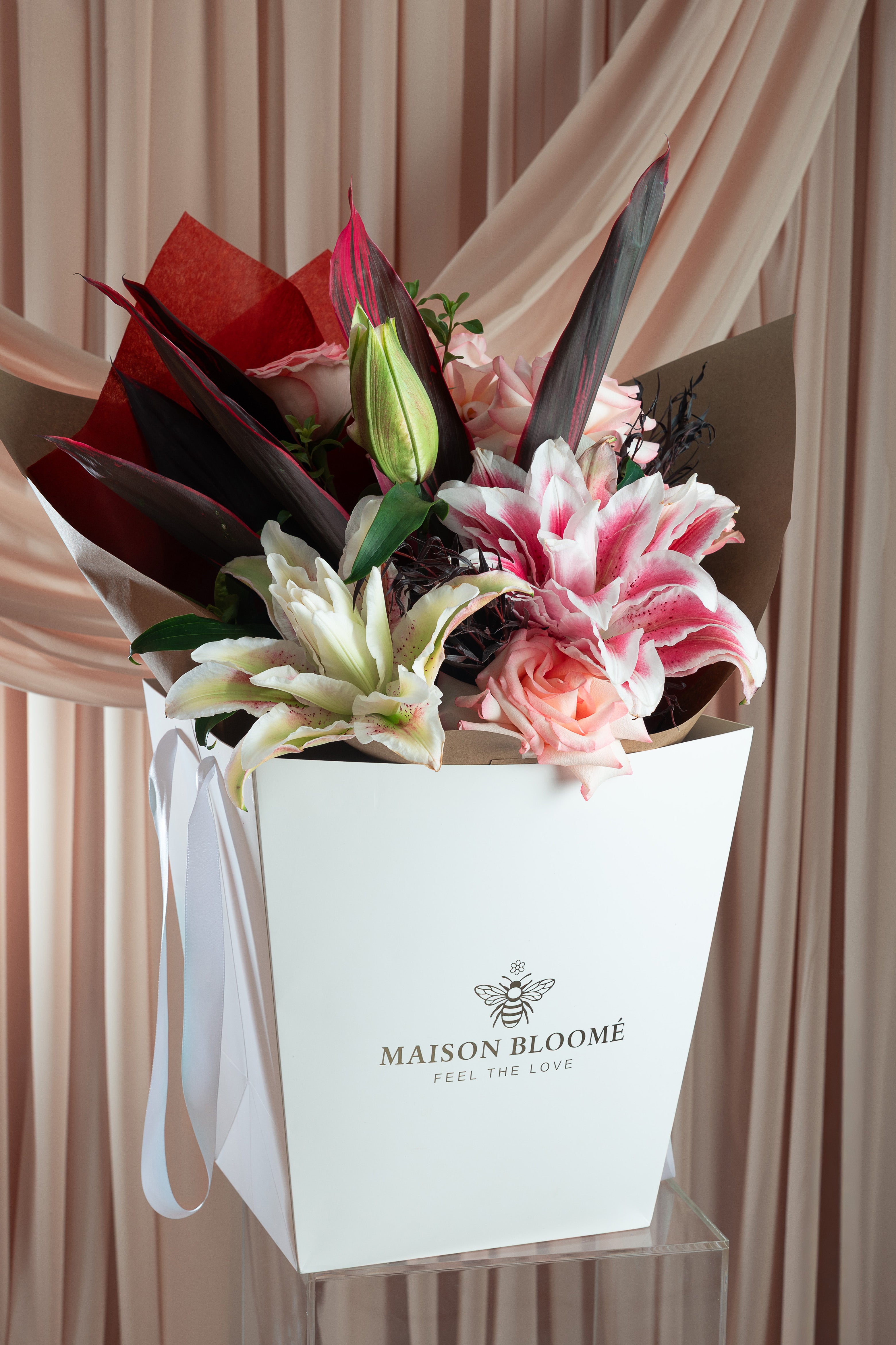 Blush lily and rose arrangement in vase by Maison Bloomé Adelaide florist