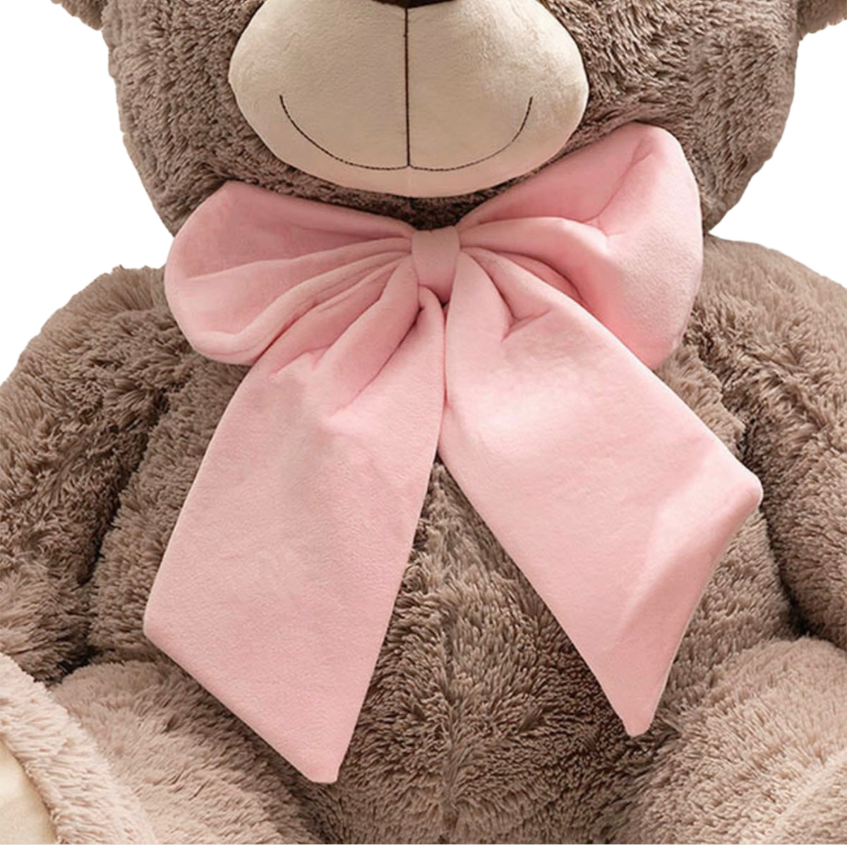 Close-up of luxury giant grey teddy bear featuring soft plush fur and oversized pink bow – Maison Bloomé Adelaide.