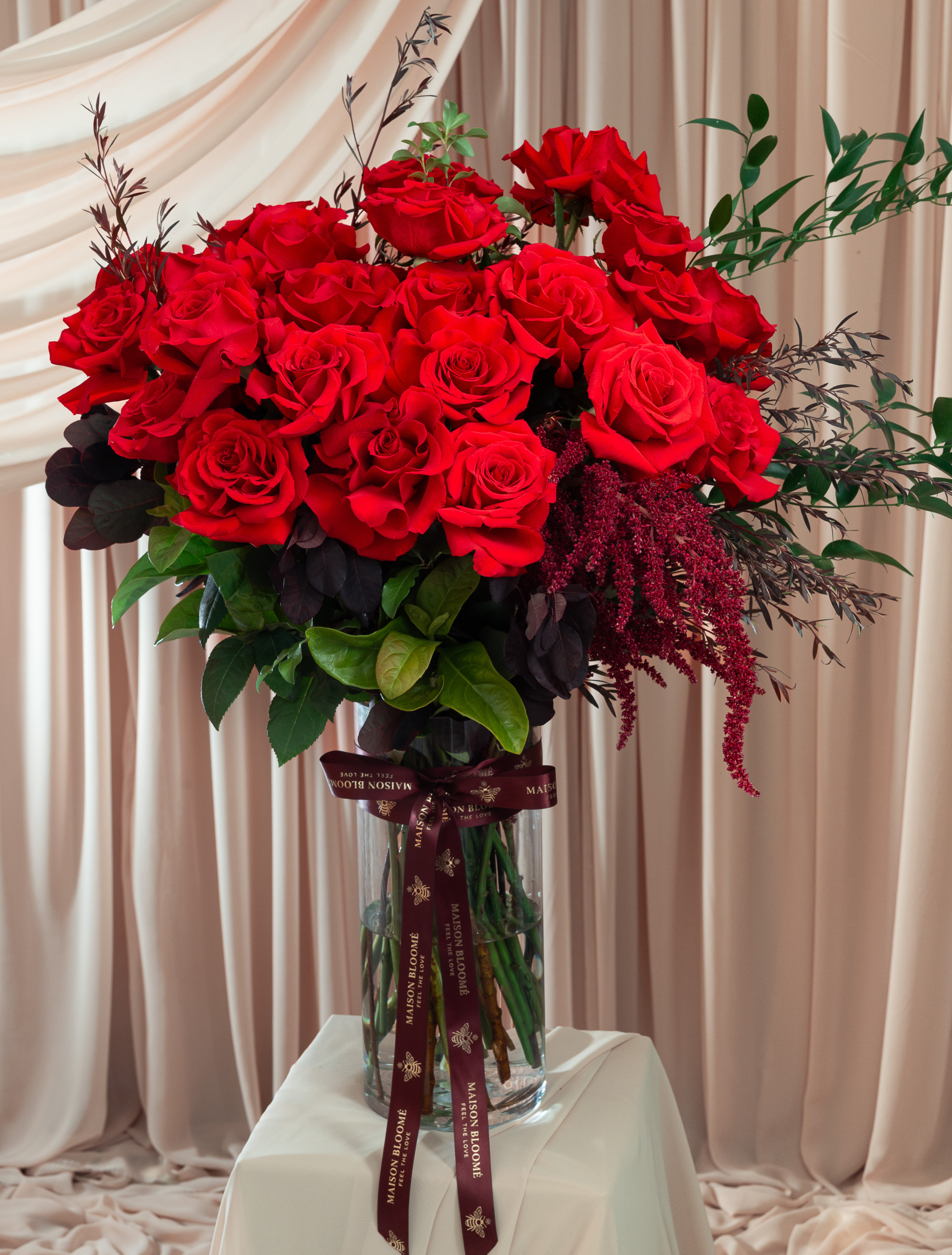 Red rose arrangement in vase Adelaide florist same day delivery Maison Bloomé