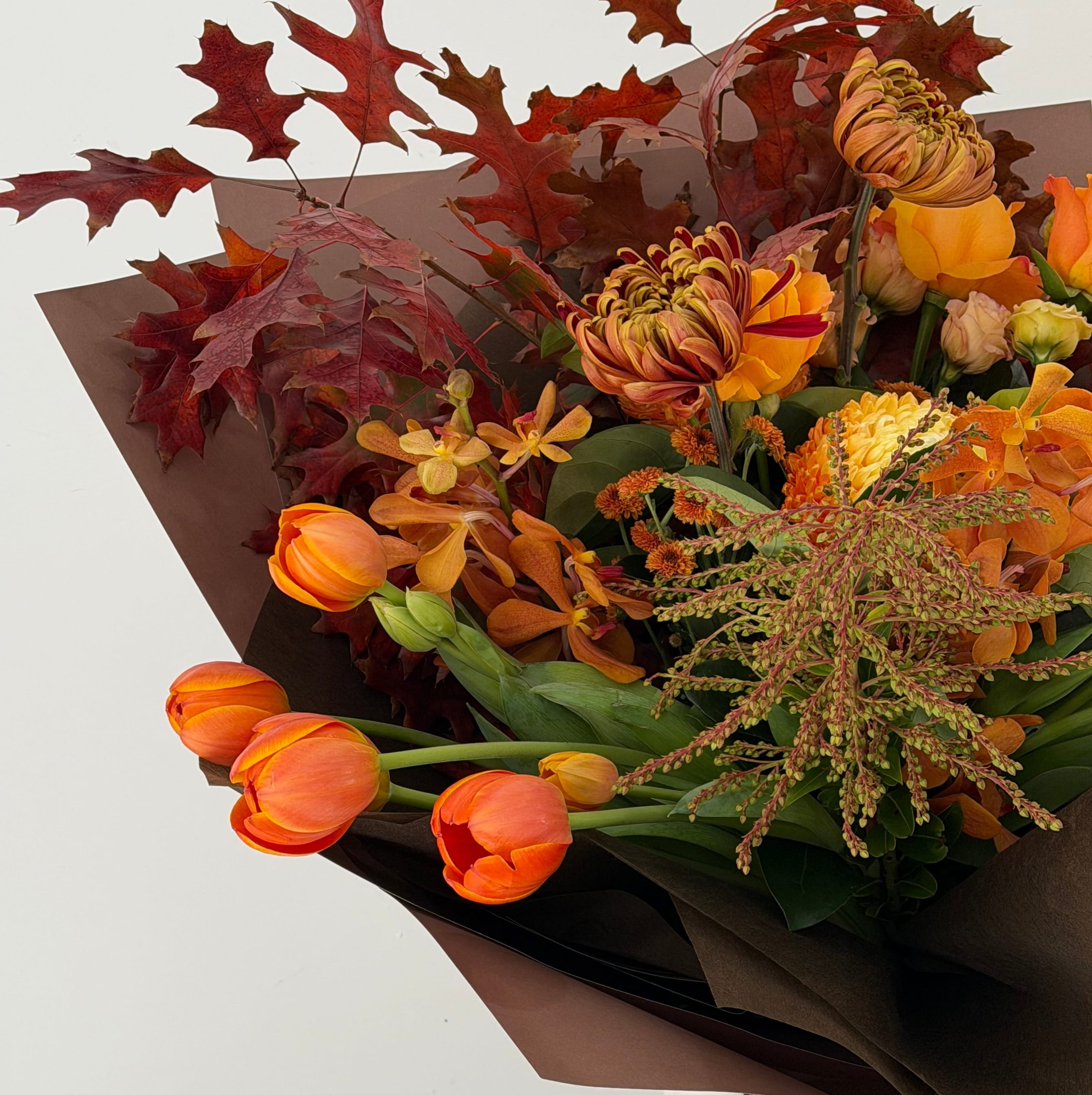 Close-up of The Autumn Edit seasonal bouquet in warm autumn tones by Maison Bloomé Adelaide.